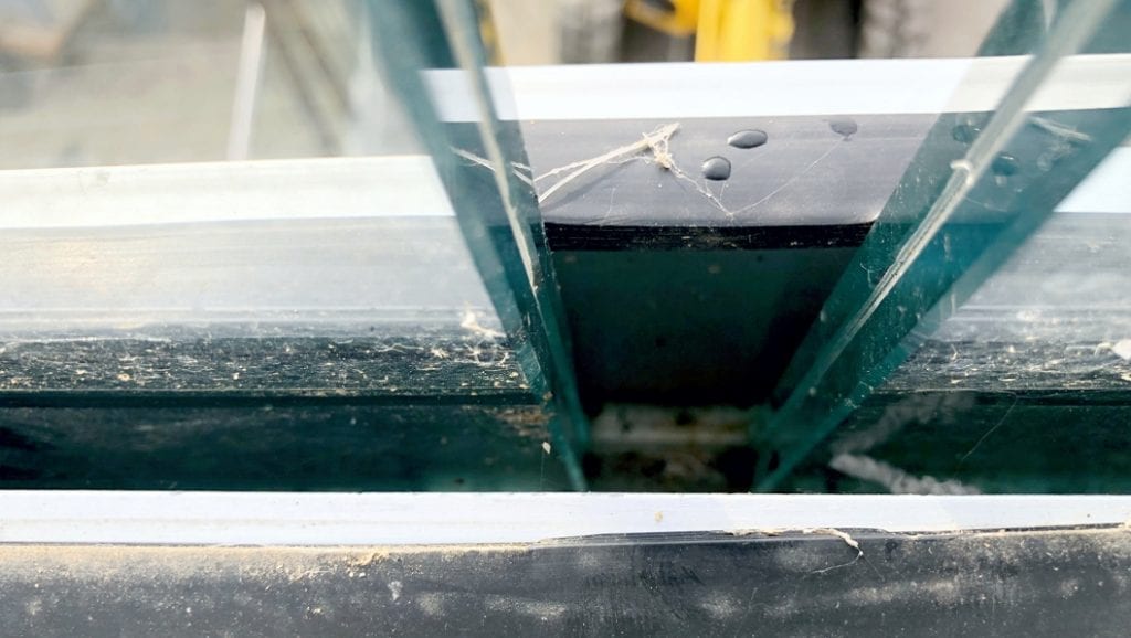 A 25mm expansion joint between panes of glass on a roof terrace