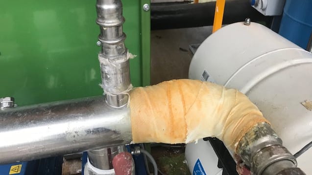 A SylWrap HD Pipe Repair Bandage applied to a high temperature elbow joint which was leaking