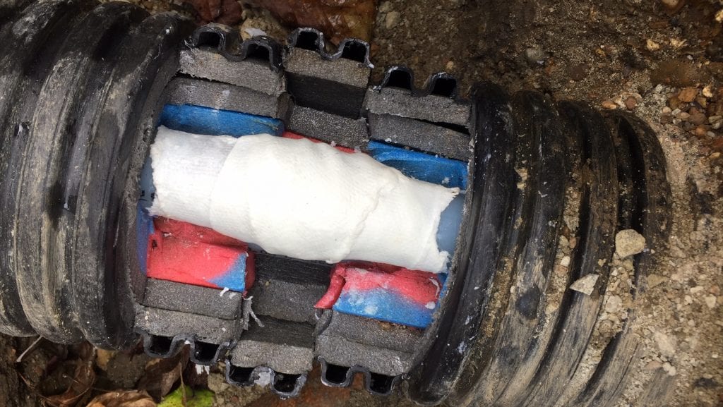 SylWrap HD Pipe Repair Bandage used to add another layer of protection to an underground heating pipe on a farm in the United Kingdom